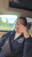 Passenger seat conversation in Tacoma, hands mid-gesture