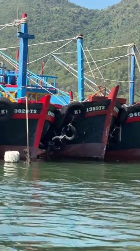 Fishing boats dock in Nha Trang harbor waters