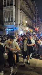 Torch-lit traditional procession through Vitoria-Gasteiz at night