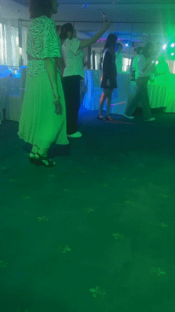 Omsk indoor event mixes slideshow presentations with party dancing