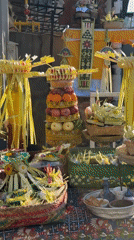 Women prepare traditional Balinese offerings in North Kuta ceremony