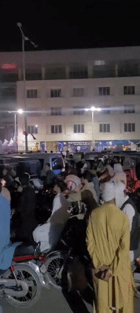Large motorcycle crowd gathers at night in Quetta streets