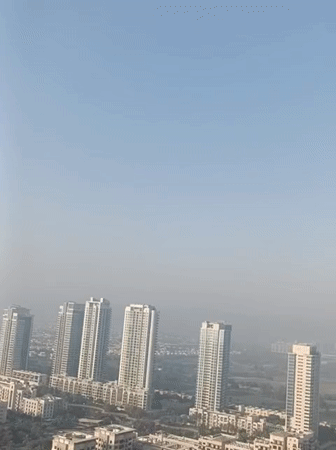 Aerial footage captures Dubai's modern cityscape and traffic patterns