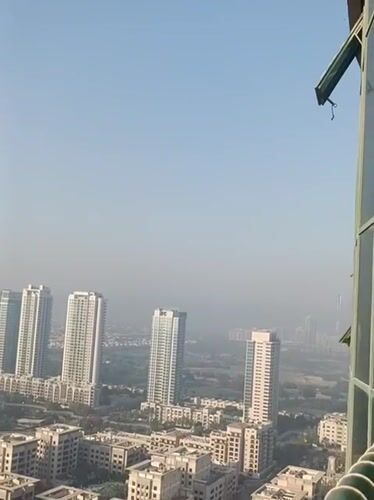 Aerial footage captures Dubai's modern cityscape and traffic patterns