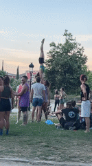Acro-yoga session in Barcelona park flows into evening drinks