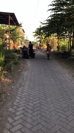 Daily street life in Kalisampurno, Indonesia neighborhoods