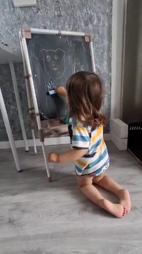 Child's morning routine with art and fresh juice in Russia