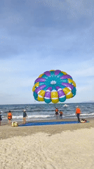 My Khe Beach buzzing with water sports and beachgoers