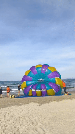 My Khe Beach buzzing with water sports and beachgoers