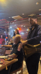 Belly dancers perform traditional restaurant entertainment for evening diners