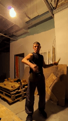 Juggling practice in a bare Qarağandı workshop