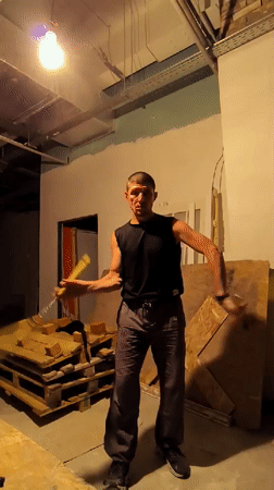 Juggling practice in a bare Qarağandı workshop