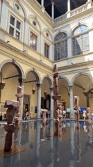 Florence courtyard sculptures and a grand historic bookstore