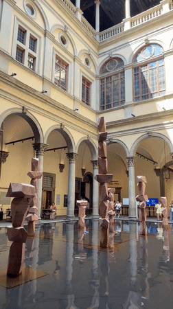 Florence courtyard sculptures and a grand historic bookstore
