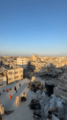 Gaza cityscape: rooftops, rubble, and damaged skyline