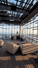 DJ setup on a Bali clifftop deck, ocean below