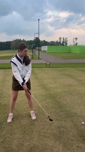A casual afternoon of golf at a Krasnoyarsk driving range