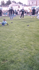 Evening crowd gathers on stadium grounds in Brest, Belarus