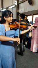 Blue-themed wedding ceremony with live violin in Semarang