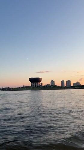 Kazan skyline and kremlin at golden hour from the riverbank