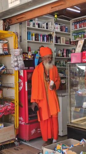 Morning street life documented across Bhagsu, India shops