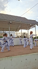 Karate class practices forms outdoors in Lhokseumawe, Indonesia