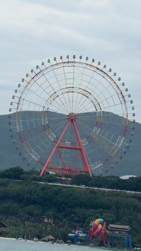 Colorful Ferris wheel observed on Nha Trang coast
