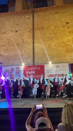 Traditional folk dancers perform at Calella Folk Festival