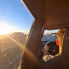 Evening commute captured on Buenos Aires highway during sunset