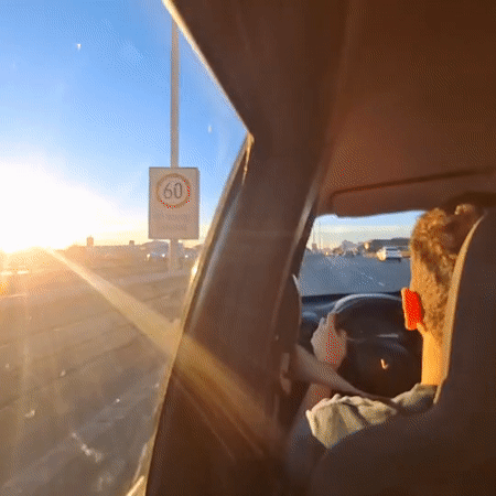 Evening commute captured on Buenos Aires highway during sunset