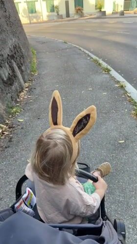 Bunny ears and a stroller in Erba, Italy