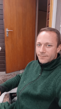 Backyard morning in Holm: smoking, gardening, and a yellow rose