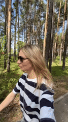 Woman takes forest selfies with baby in Chaikovsky