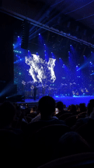 Orchestra performs at Almaty theater with multimedia display