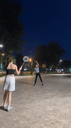Late-night badminton in a Krasnogorsk park