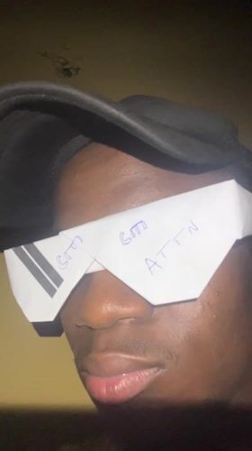 Man Creates Paper Eyewear with Written Messages in Nigeria