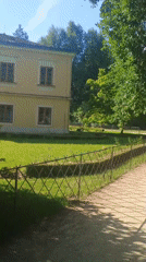 Visitor documents historic gardens in Kroměříž on sunny afternoon