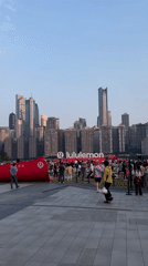 Lululemon sponsors mass outdoor yoga event in Chinese city plaza