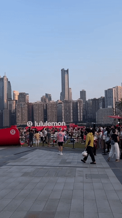 Lululemon sponsors mass outdoor yoga event in Chinese city plaza