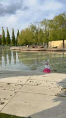 Child visits reflecting pools at Krasnodar park with art installation