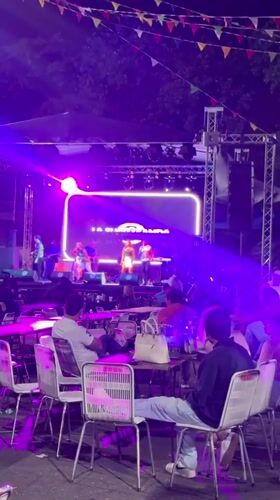 Venezuelan band performs nighttime outdoor concert in La Morita