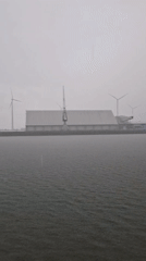 Rainy day vessel journey documented near Dutch offshore wind farm
