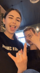 Young people socialize, take selfies at Russian cafe
