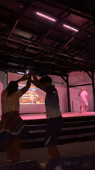 Late-night karaoke performance draws crowd at Venezuelan outdoor theater