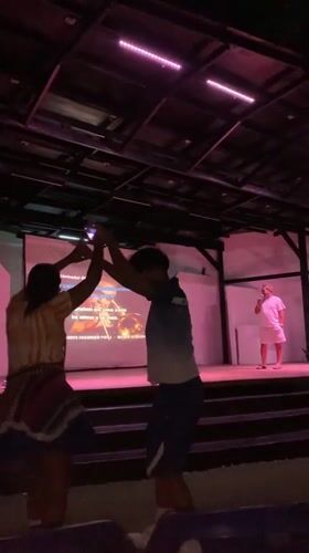 Late-night karaoke performance draws crowd at Venezuelan outdoor theater
