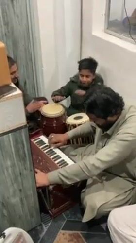 Traditional music session and street life documented in Loralai