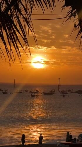Morning beach life captured at Kuta Indonesia cafes