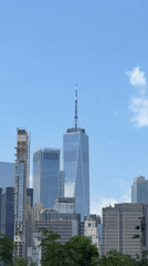 Lower Manhattan skyline on a clear day, One WTC dominant.