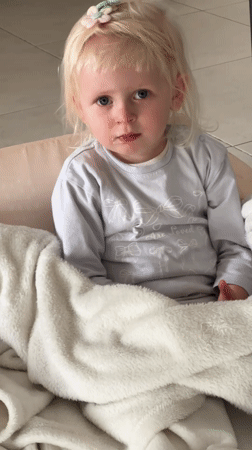 Young girl in blanket observed in Petah Tikva