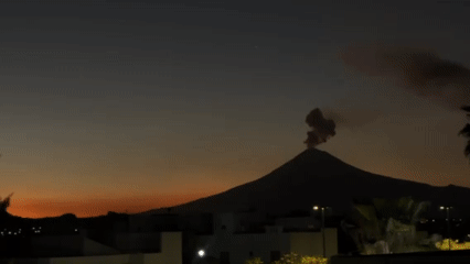 Volcano erupts near San Bernardino Tlaxcalancingo at dawn
